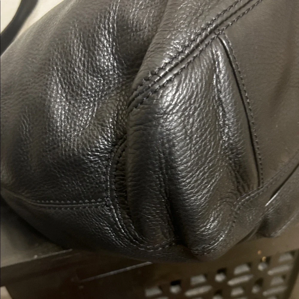 Michael Kors Black Hobo Bag with Gold Accents